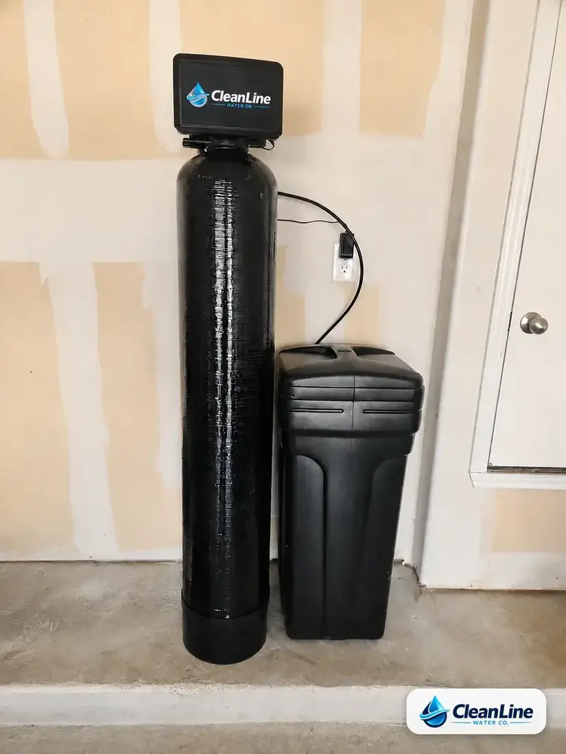 CleanLine Water Co. water softener loop installation in an Austin TX garage, completed by a licensed, insured and bonded plumber serving Central Texas